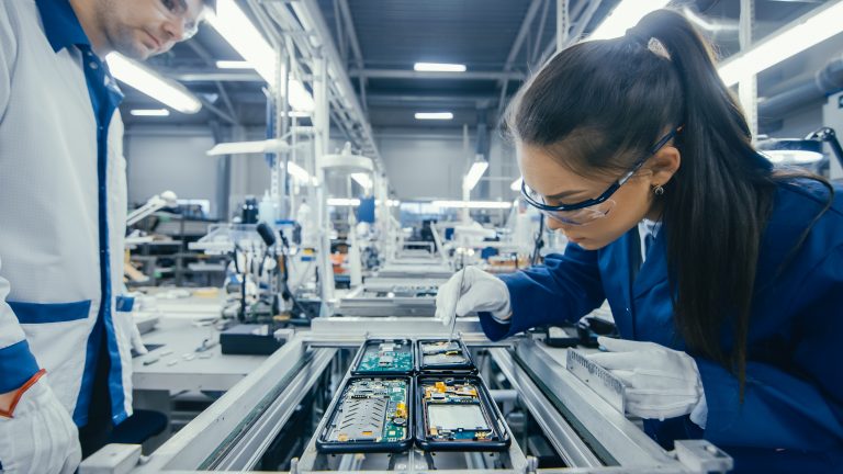 Shot of an Electronics Factory Workers Assembling Circuit Boards